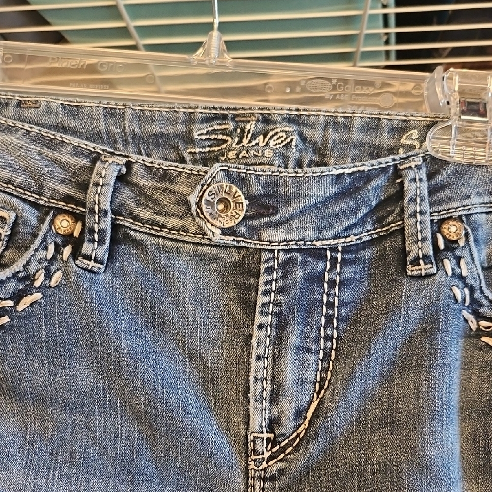 Silver Jeans Blue Denim with Contrast Stitching and Distressing